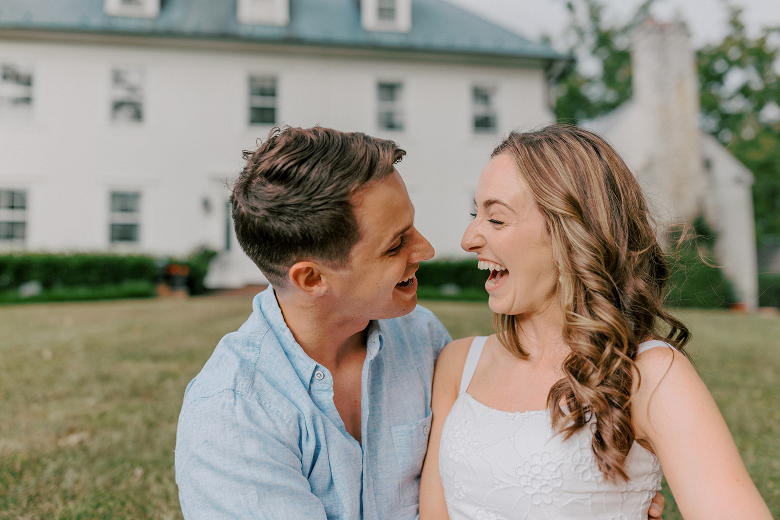 Couple laughs hard together engagement photos in Warrenton
