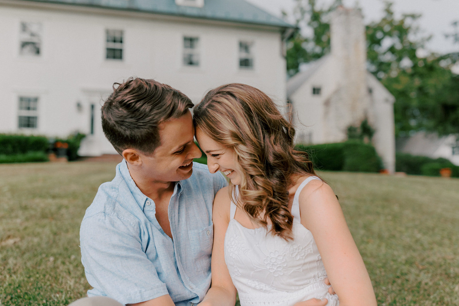 Couple laughs together engagement photos in Warrenton