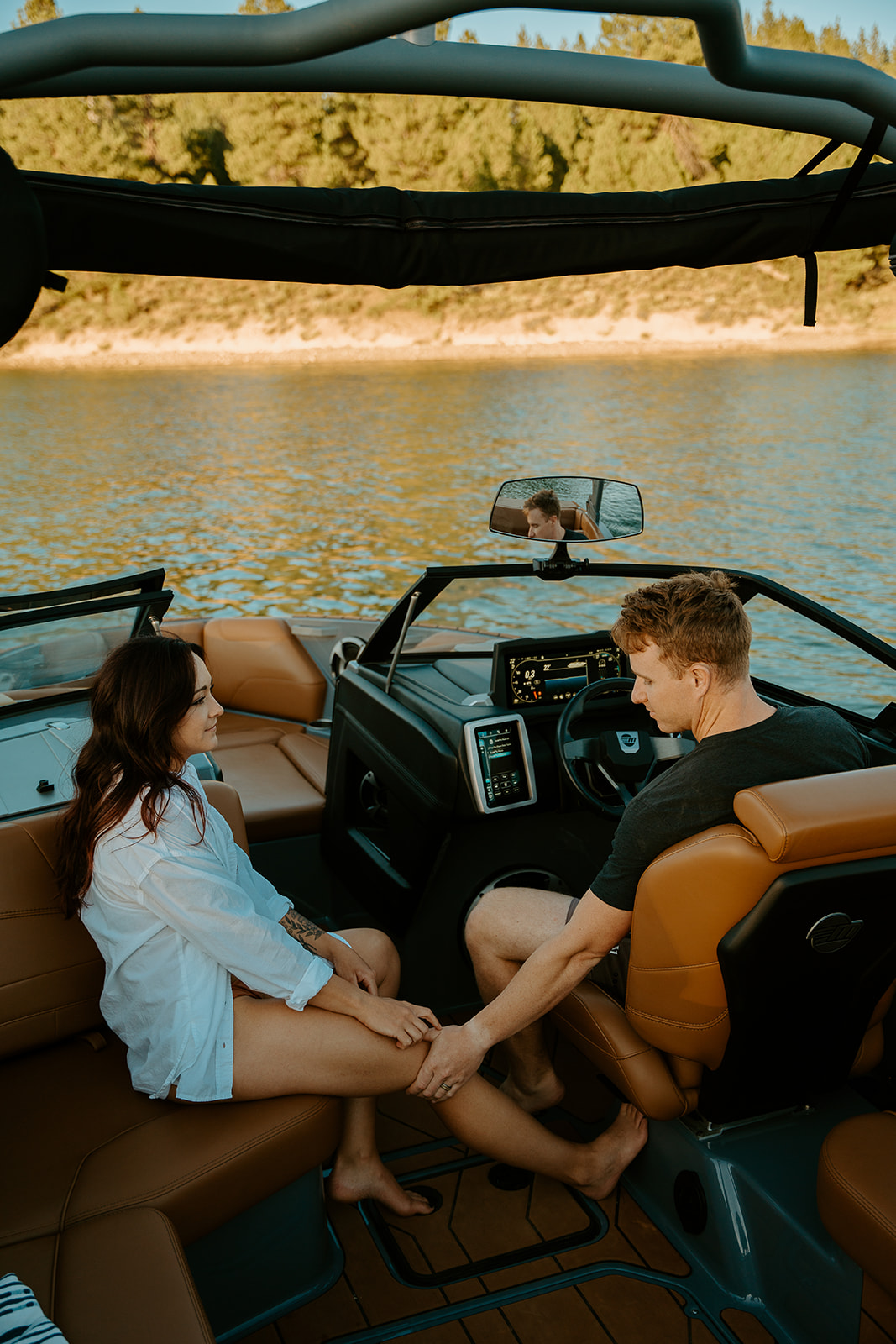 couples photos on their malibu boat engagements on the water near truckee california