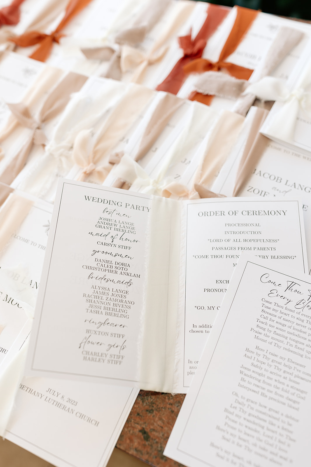 griffith house anaheim california socal orange county wedding white stationery red nude beige ribbons pamphlet program
