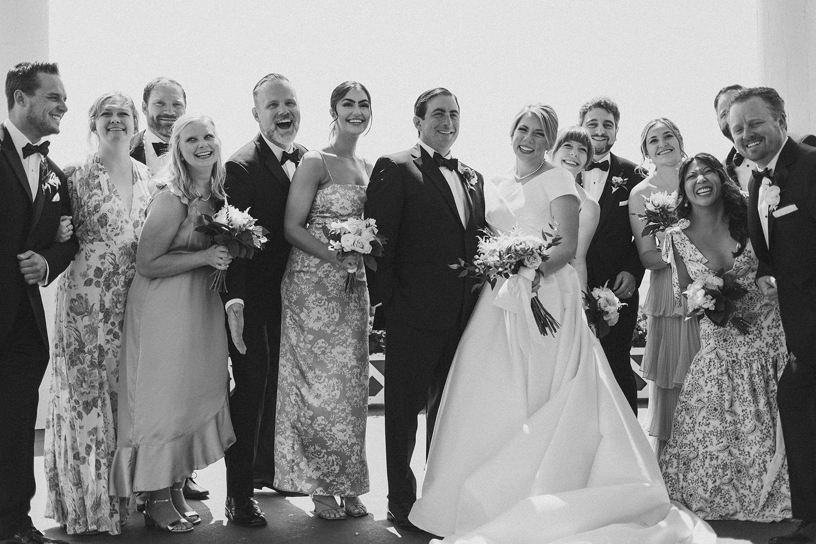 Black tie wedding party photos on the front porch of the Grand Hotel in Mackinac Island