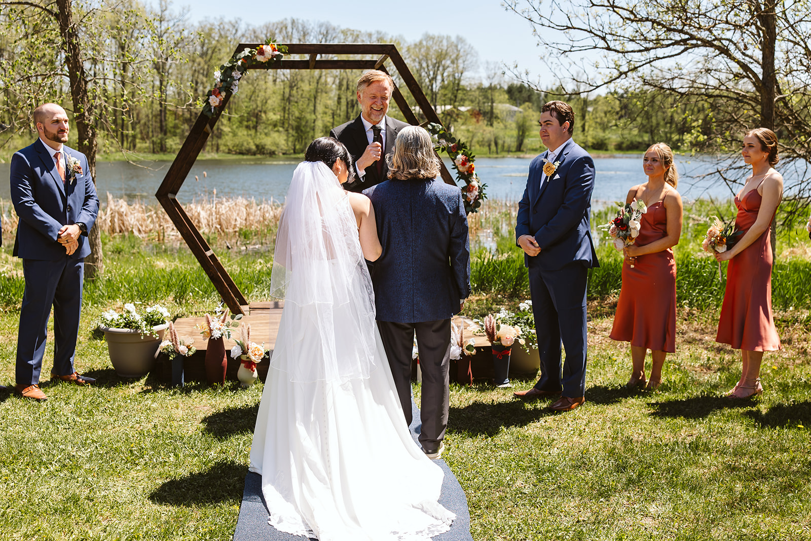 An intimate Northern Minnesota wedding took place along a lakefront resort.