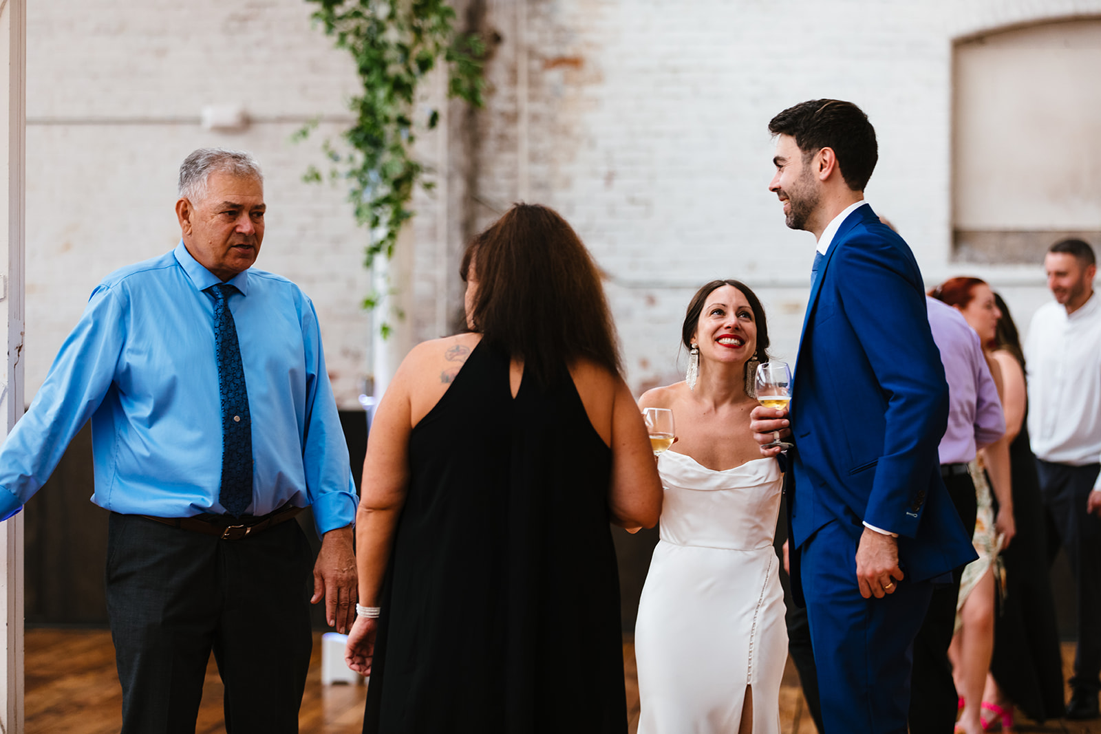Guests mingle at the Greylock Works Wedding