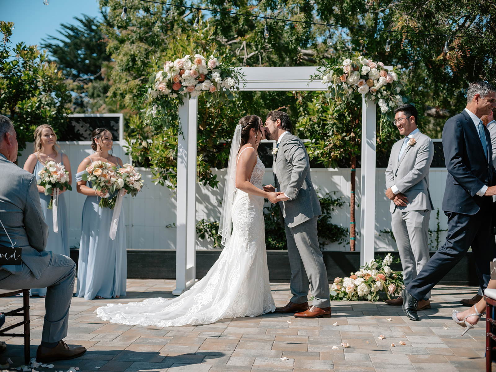 the perry house wedding monterey california bride walking down aisle father giving away daughter wedding arch flowers