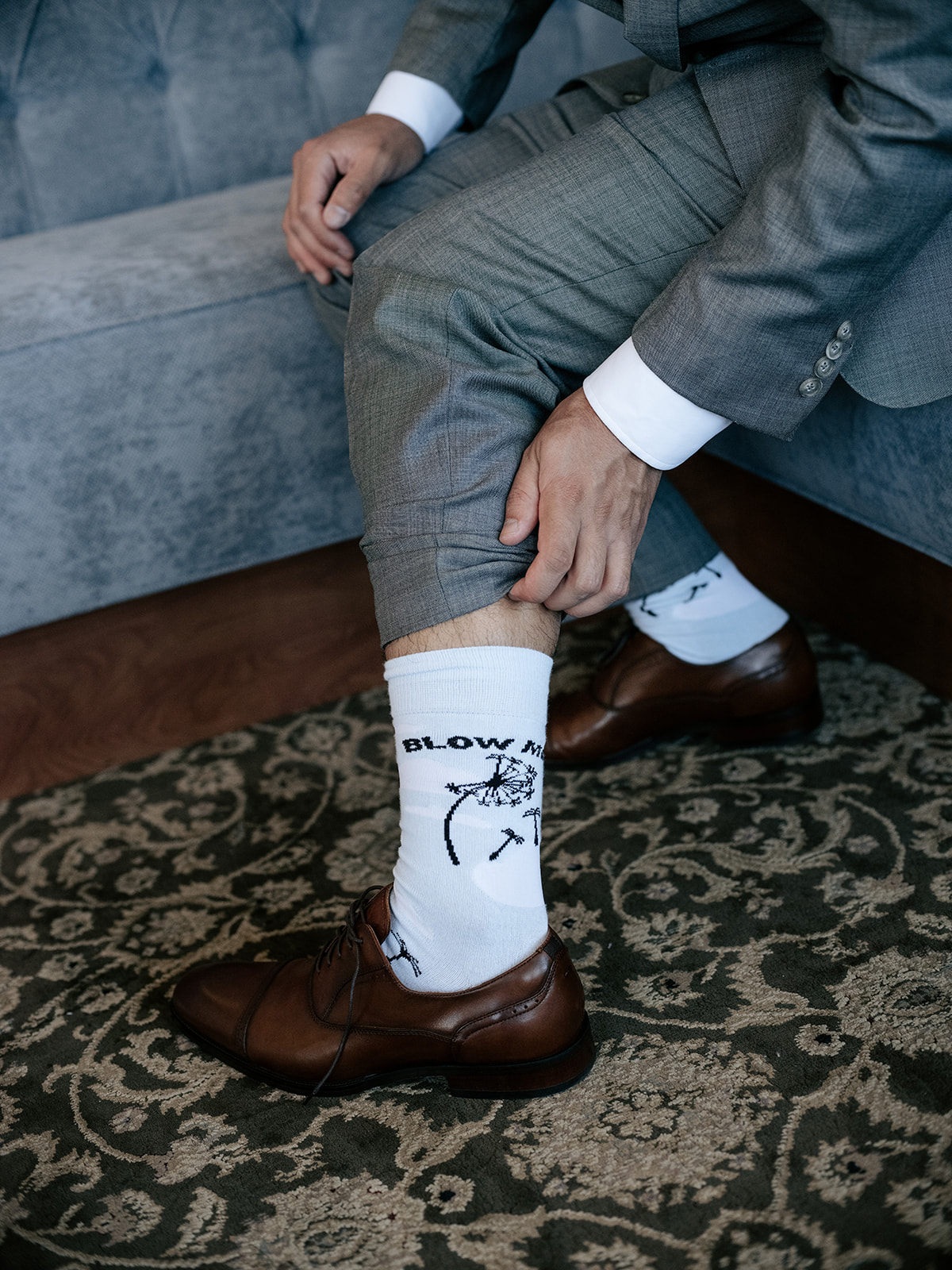 the perry house wedding monterey california groom getting ready pictures gray tux suit personalized socks b&w pictures