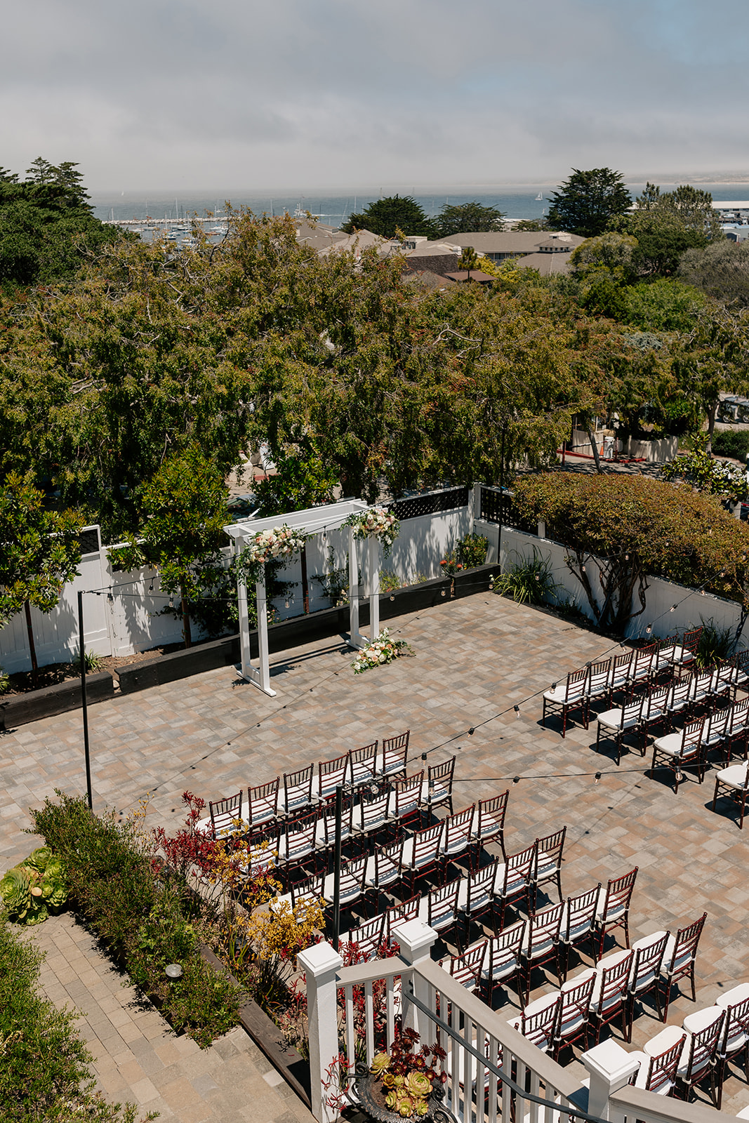 the perry house wedding monterey california outdoor wedding ceremony outdoor seating ideas wooden trellis arch