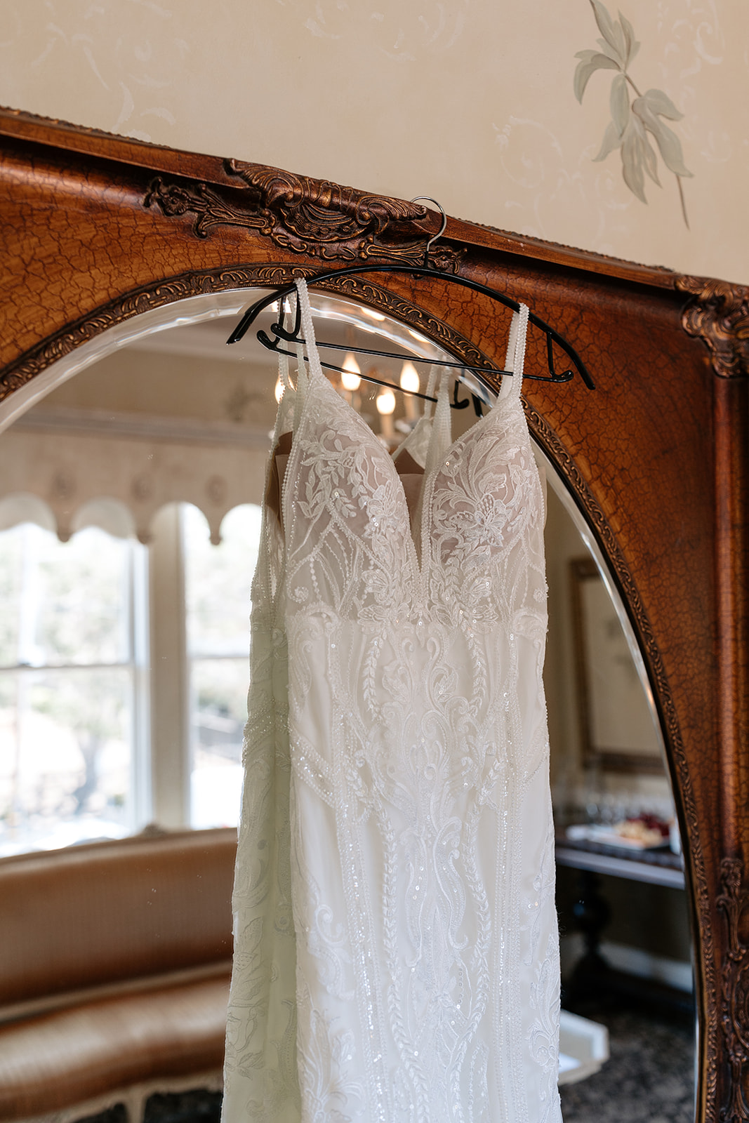 the perry house wedding monterey california details getting ready bride sheath wedding dress lace wedding dress trail