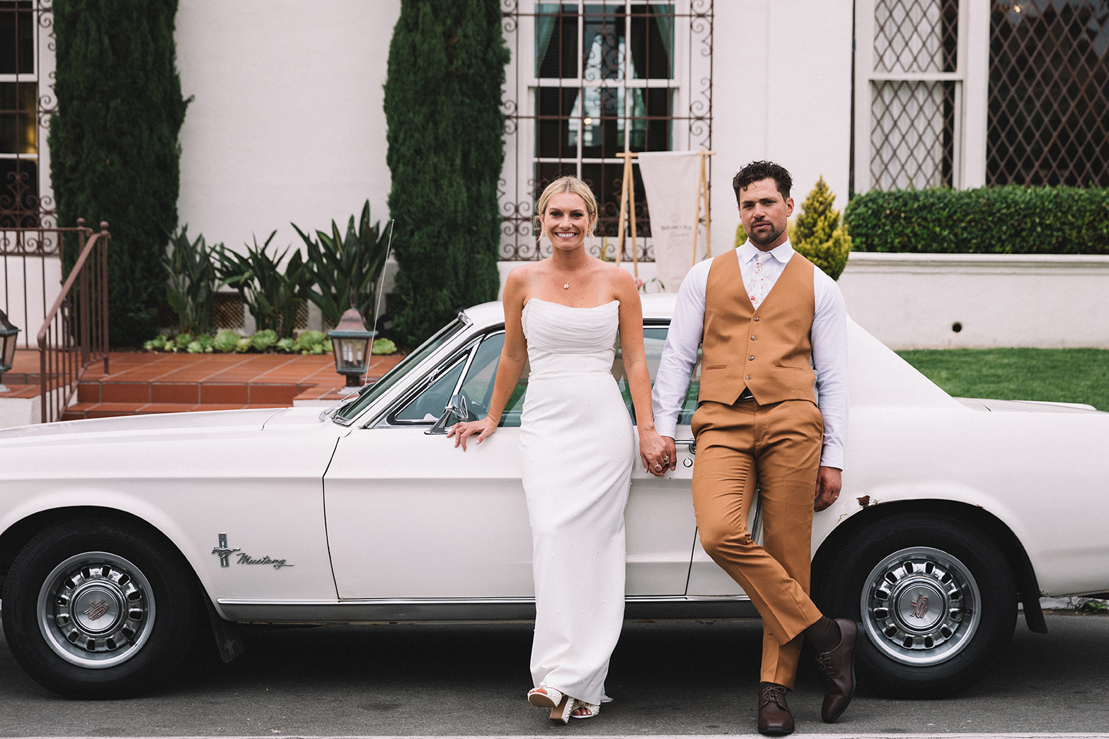 vintage mustang wedding getaway car