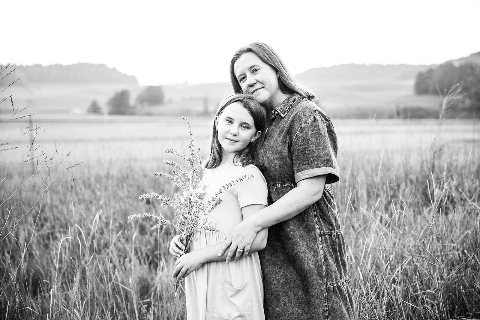 Mother Daughter session in tall grassy field at sunset, Plain WI