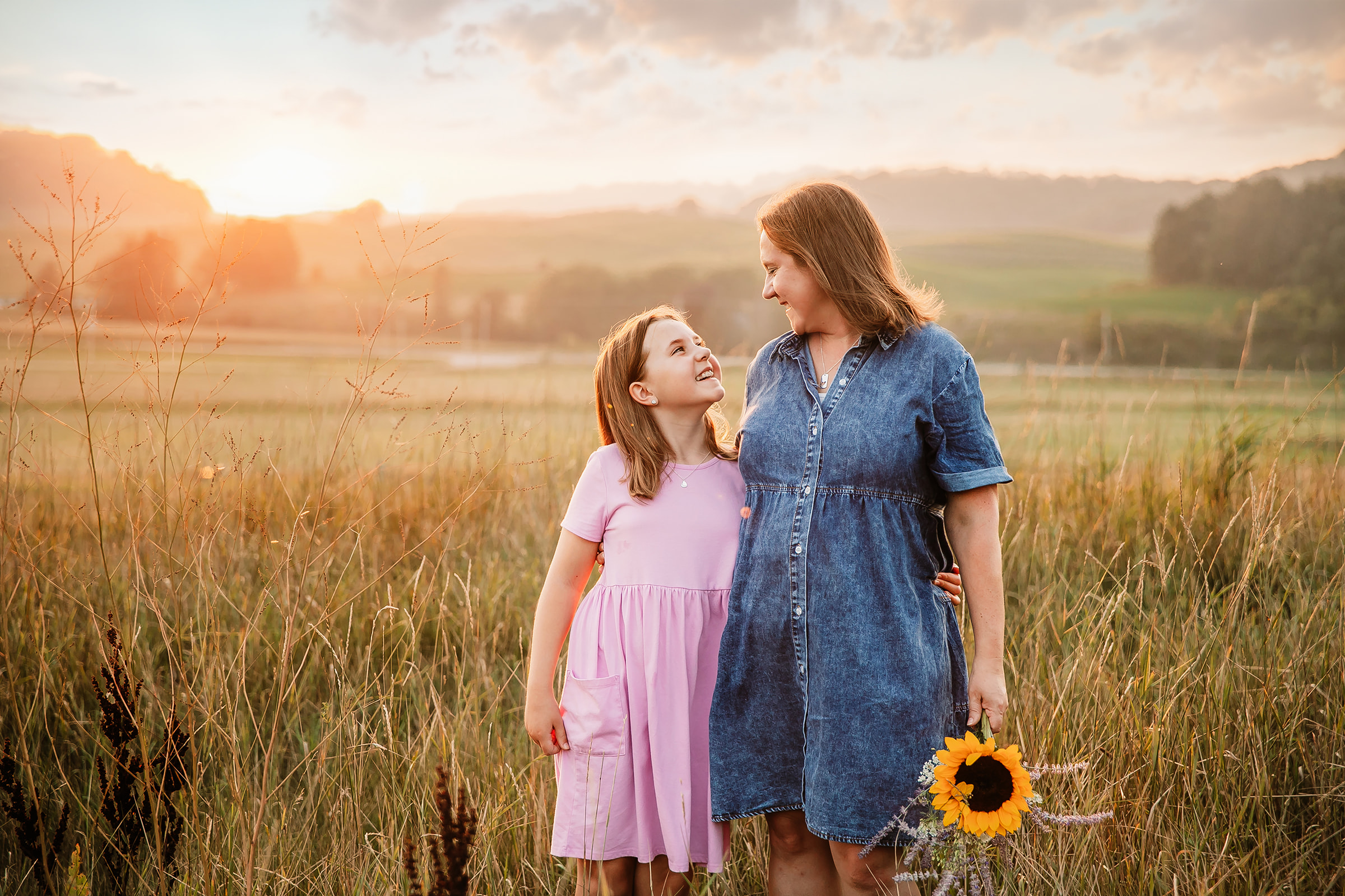 Mother Daughter session in tall grassy field at sunset, Plain WI