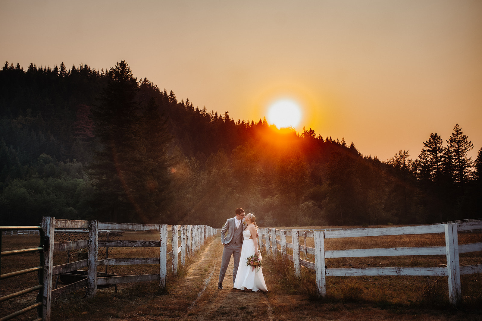 ranch wedding at sunset by sound and sea photography 
