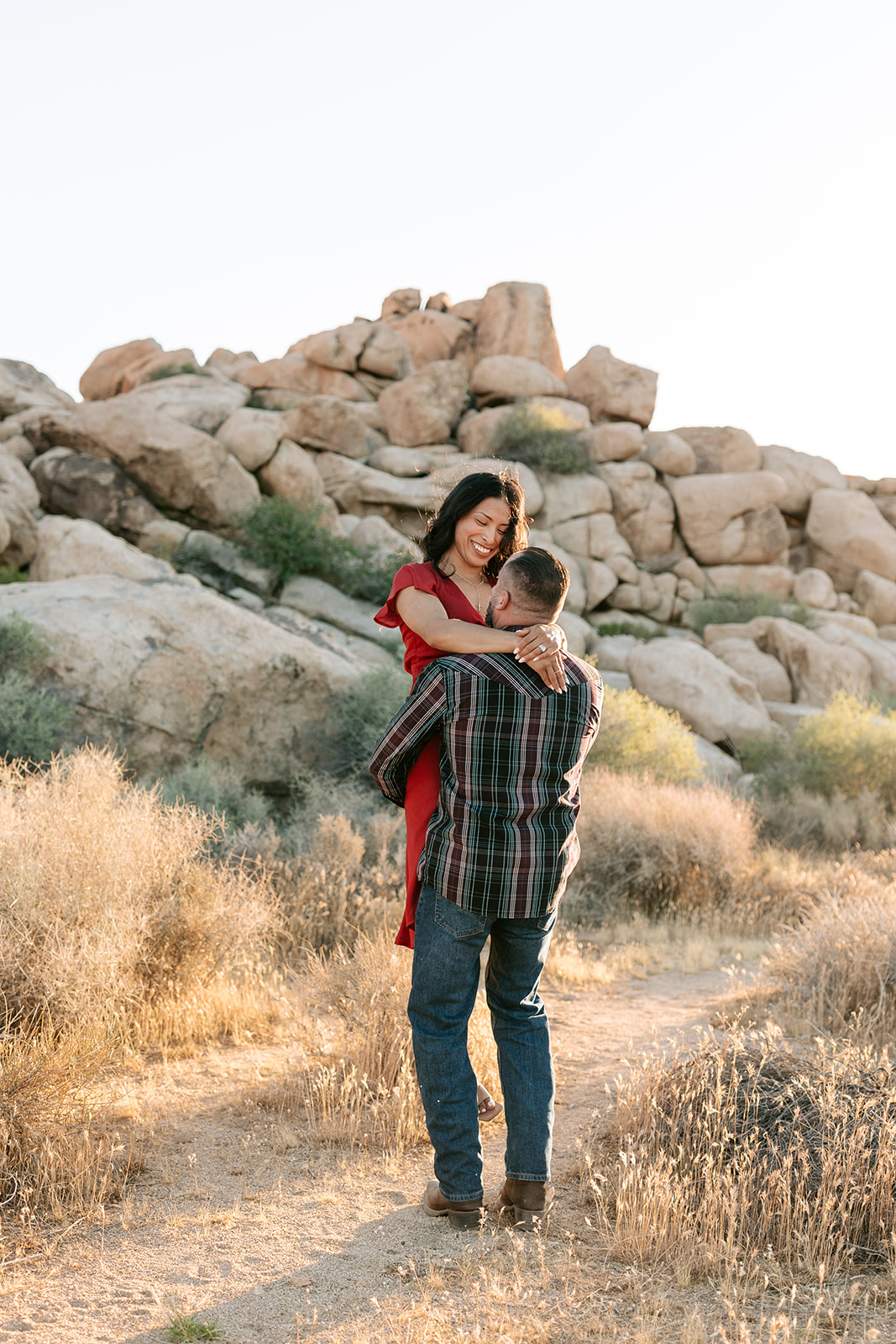 sunset engagement session joshua tree national park california red dress engagement outfit button up engagement outfits