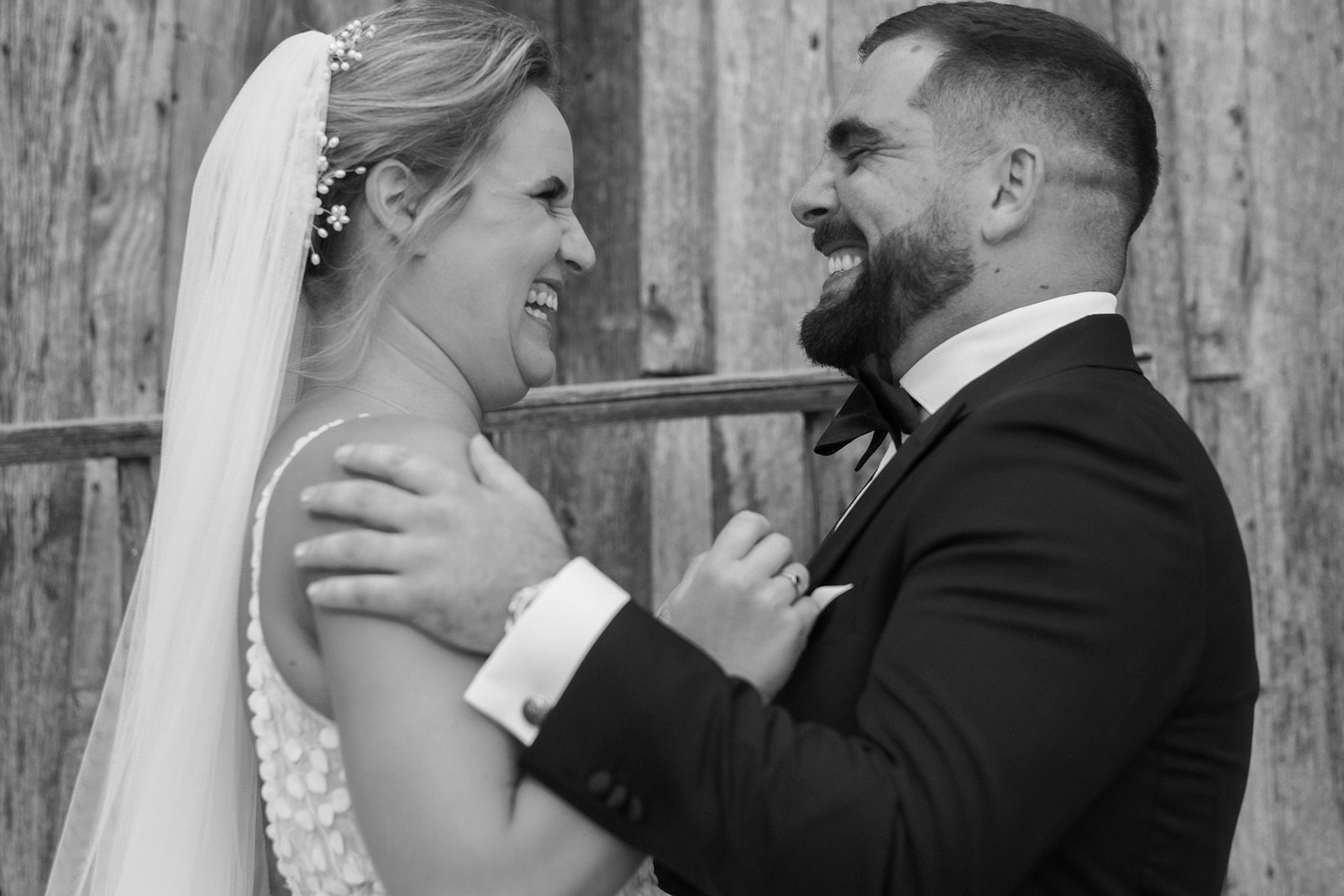 Bride and groom embrace during first look at Virginia wedding