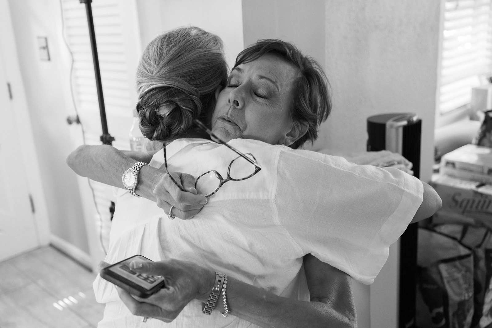 Bride and Mom embrace during getting ready at Loudoun County wedding