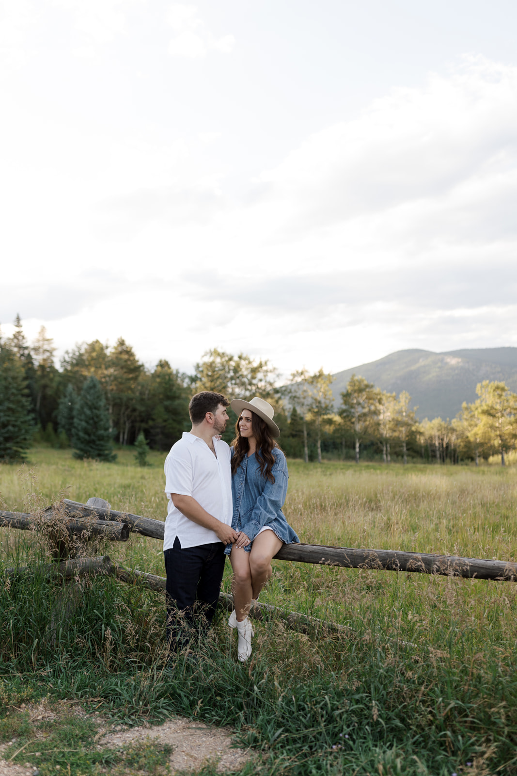 Timeless Colorado engagement photos showcasing a couple's love amidst the stunning Rocky Mountain backdrop. 