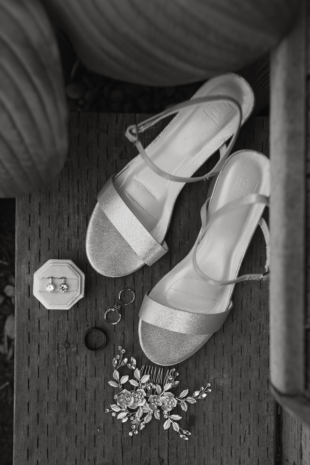 copper gables barn wedding roy washington state wedding flat lays wedding rings wedding heels groom wedding details