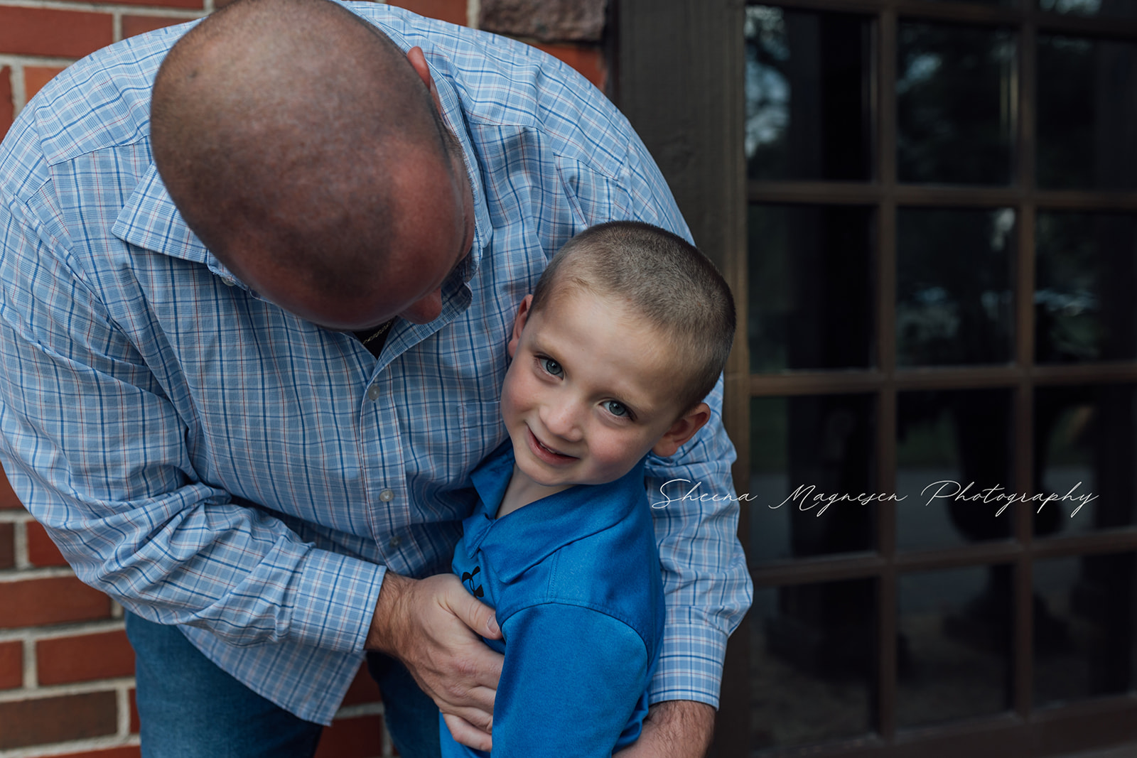 Outdoor family session near Naperville, IL with a dad, mom, two sons and one year old daughter at an old estate.