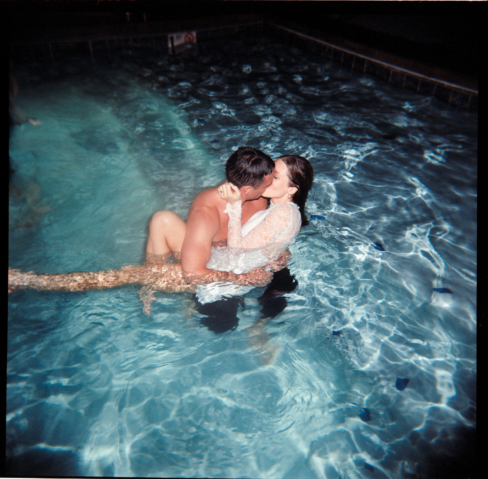 Bride and groom in the pool
