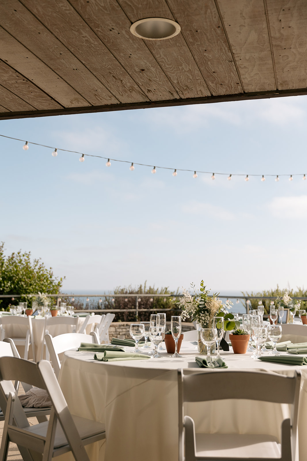 point vicente lighthouse wedding rancho palos verdes california outdoor reception white wedding table detail centerpiece