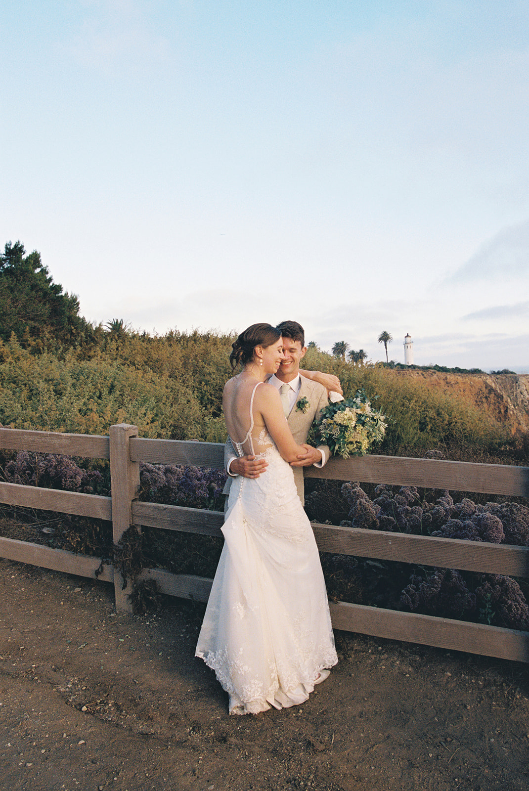 point vicente lighthouse wedding rancho palos verdes california bride and groom newly wed portraits bubbles film photos