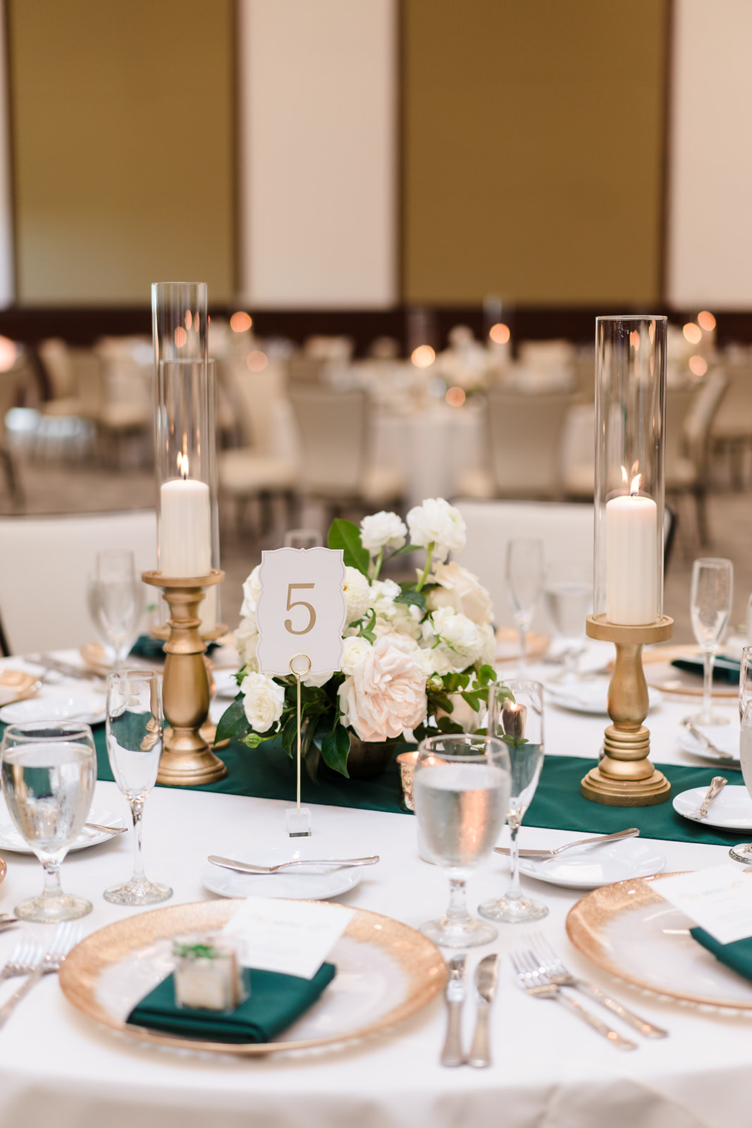 Green and gold wedding reception table decor