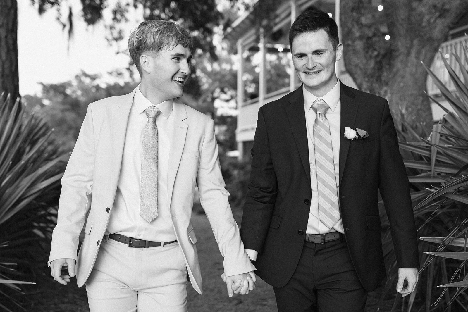 two grooms wedding portraits in Mount Pleasant Club Creek at I'on