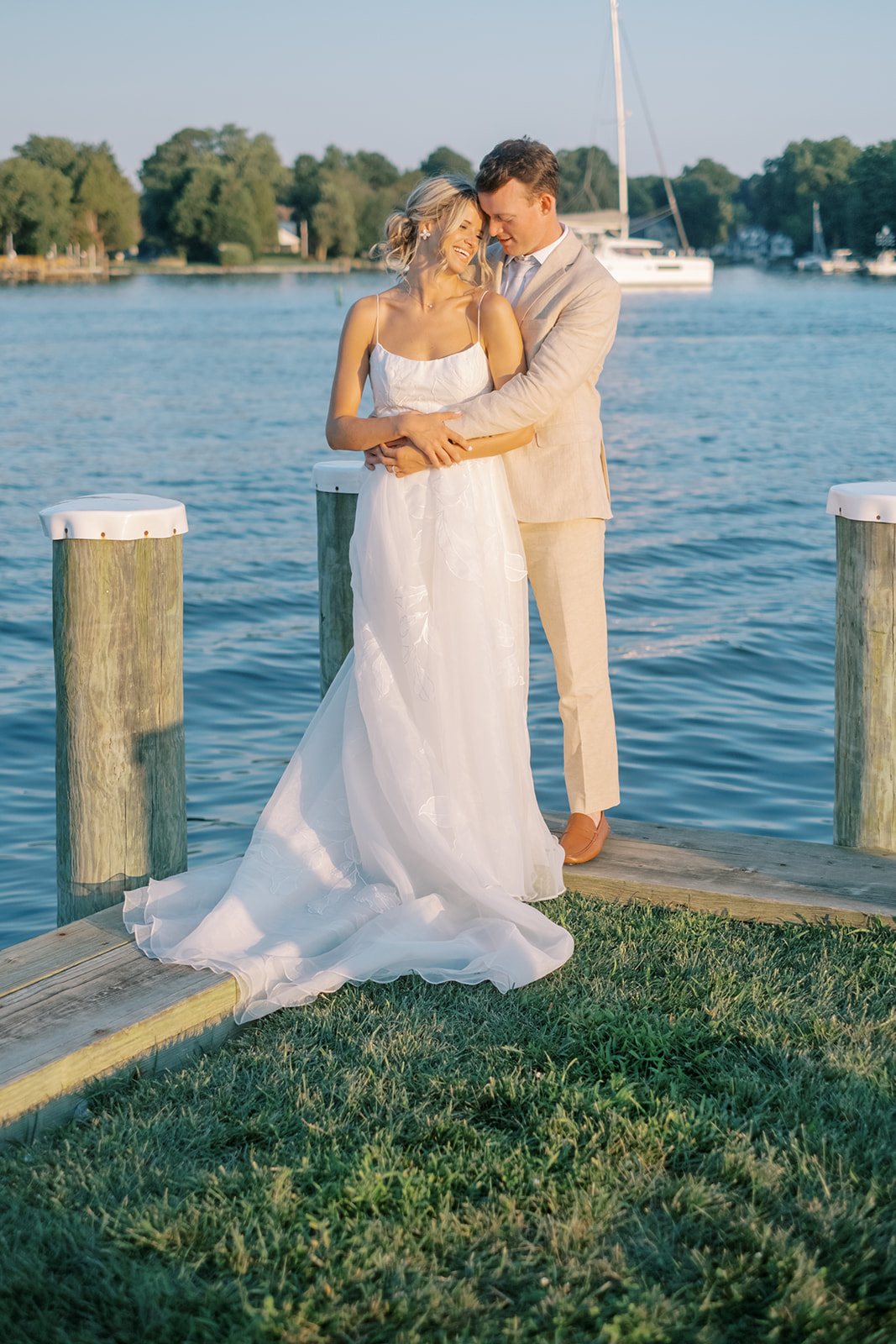 bride and groom portrait on the bay at saint michaels wedding chesapeake bay maritime museum