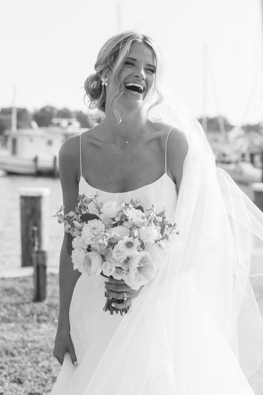bride laughing during portraits at saint michaels maryland wedding