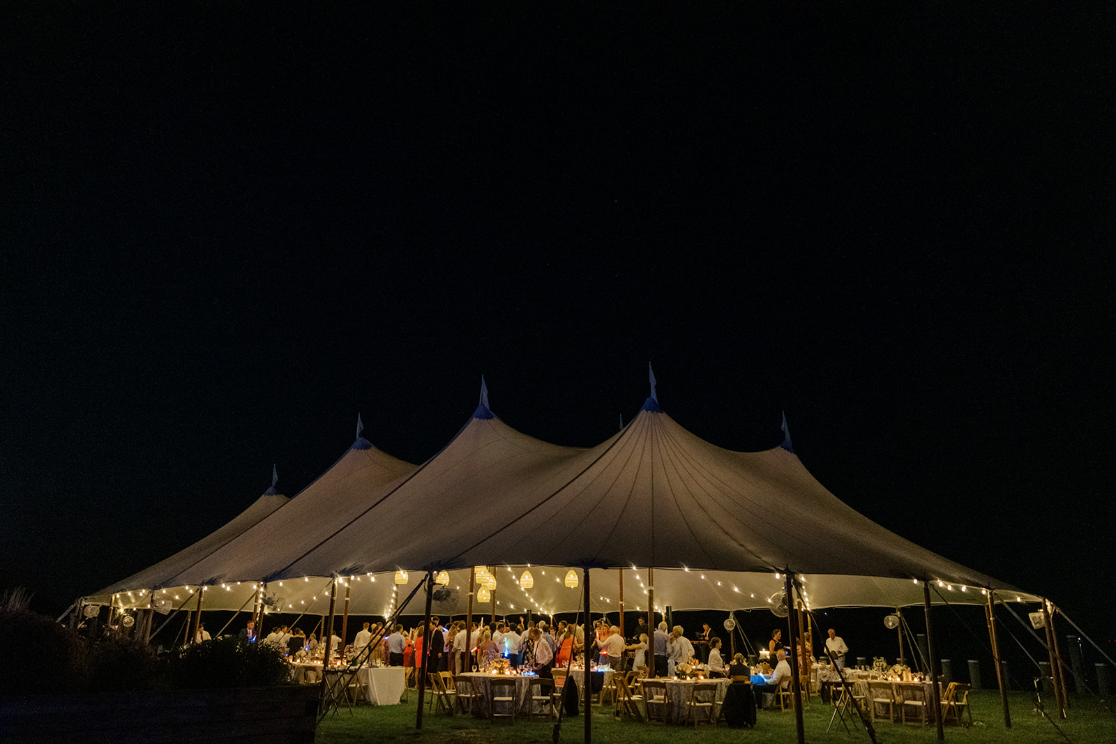 chesapeake bay maritime museum wedding reception tent at night in saint michaels maryland