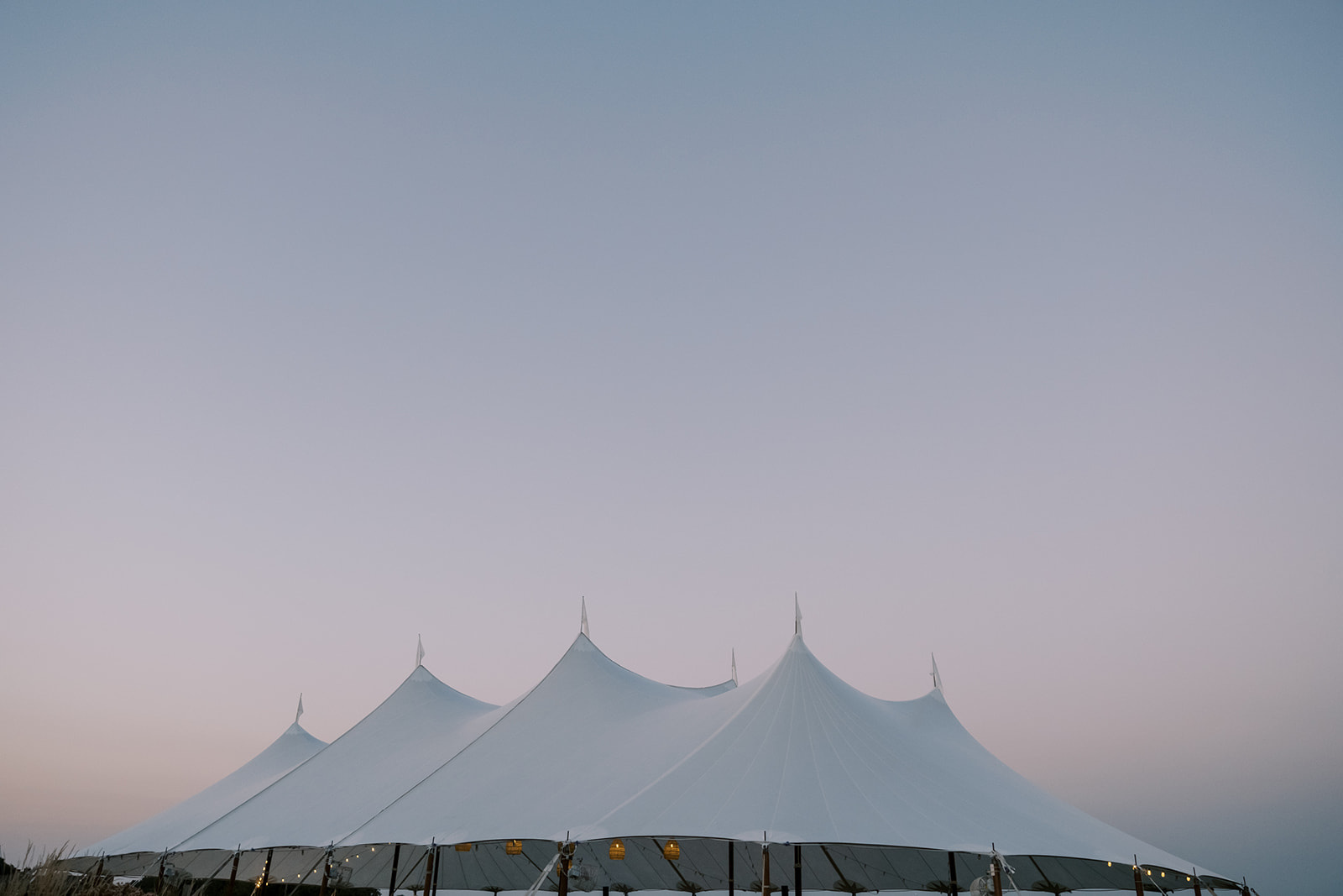 chesapeake bay maritime museum wedding reception tent at sunset