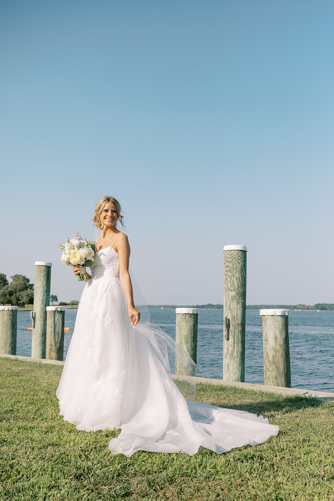 gorgeous bridal portait on the chesapeake bay at the maritime museum in saint michaels maryland