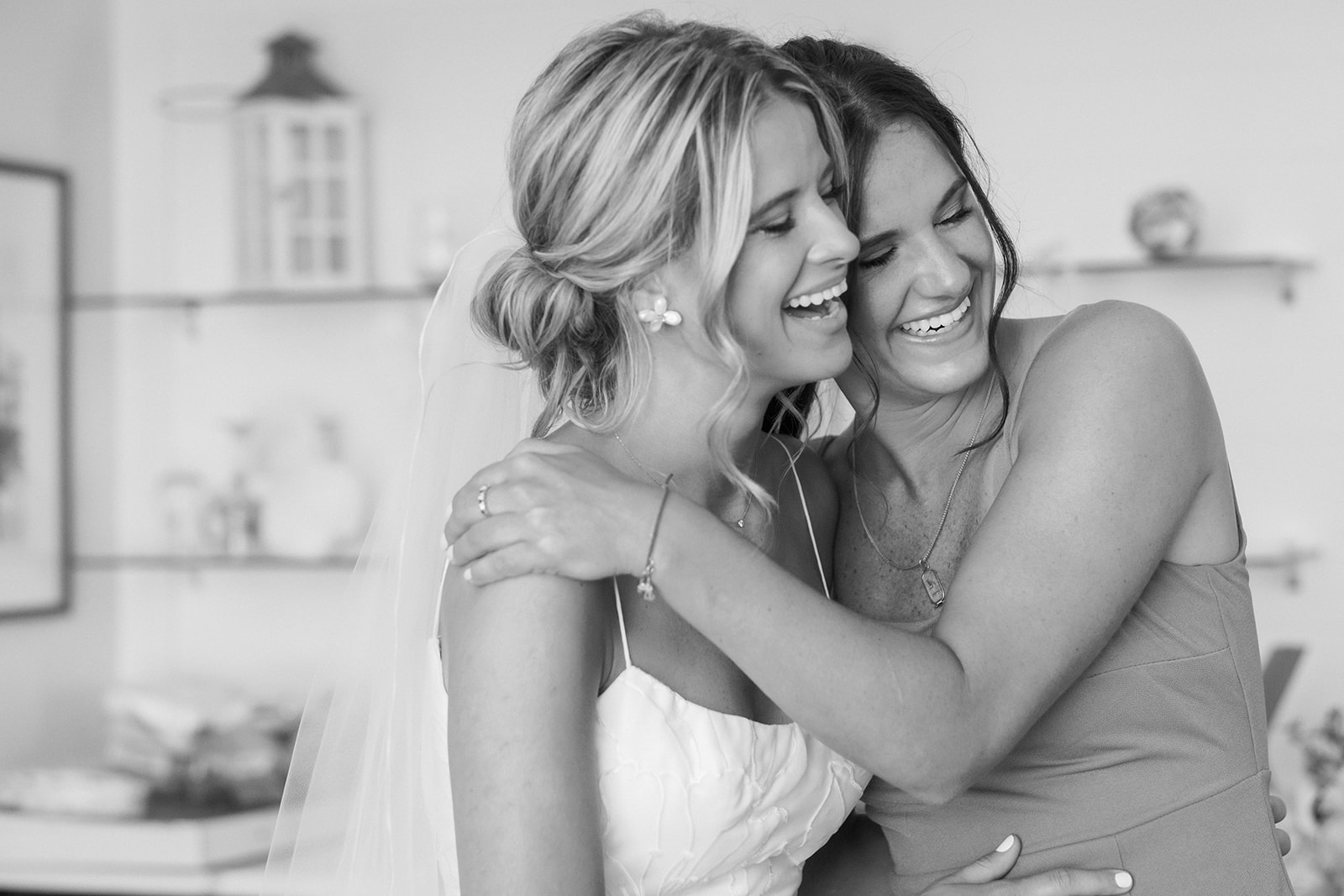 sisters embrace during getting ready at saint michaels wedding