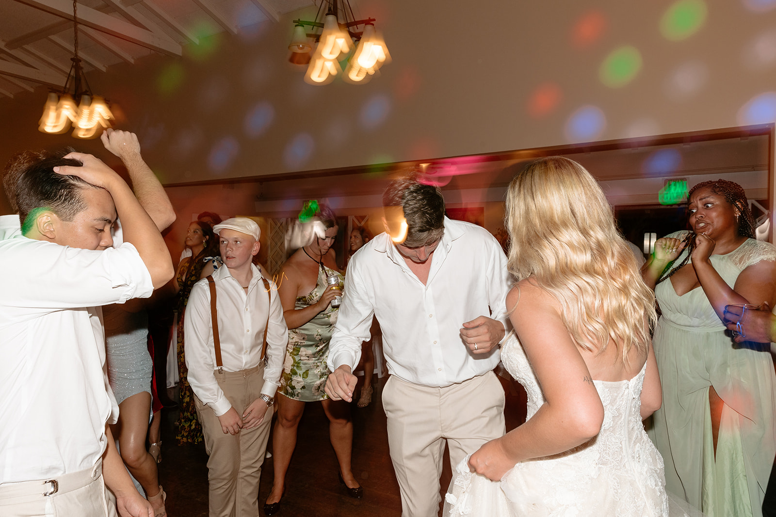 womens club wedding southern california laguna beach socal wedding party dance floor guests dancing song ideas dj