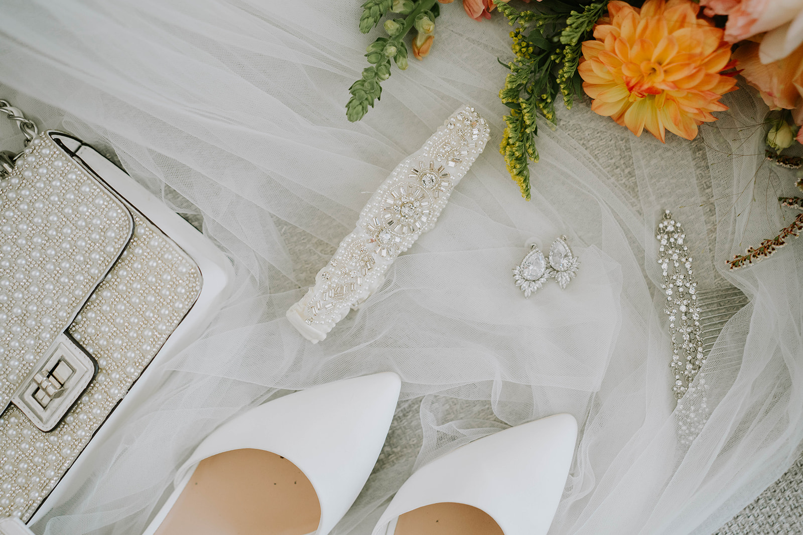 flat lay of wedding bridal details