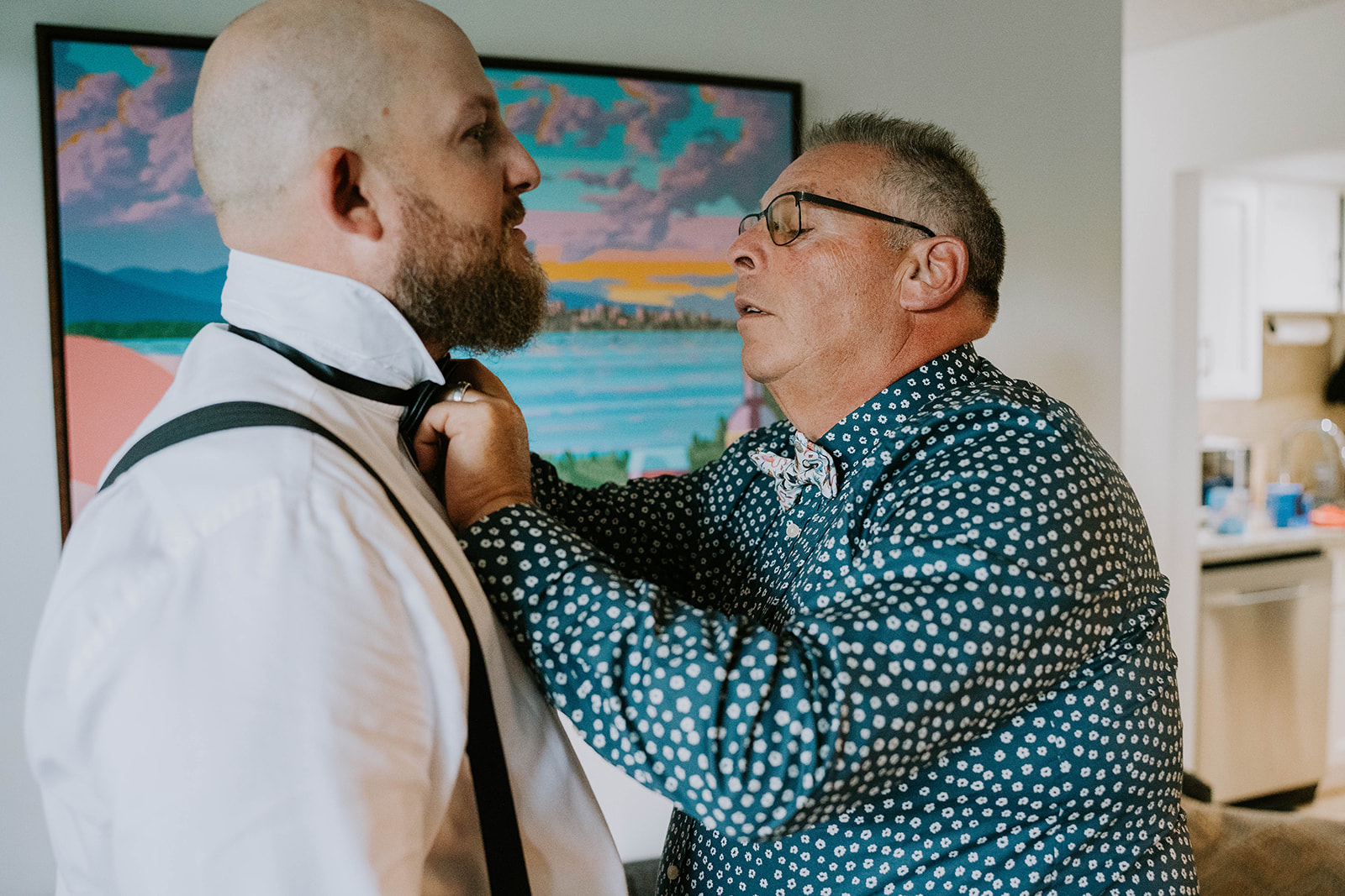 groom and his father getting ready