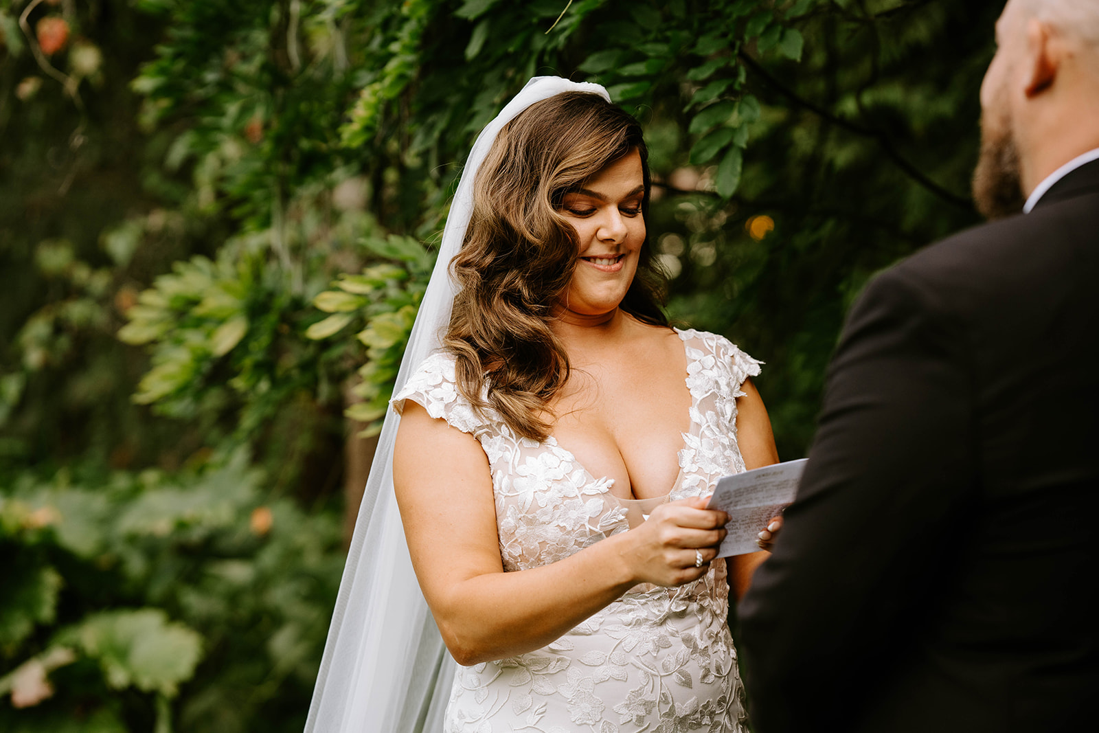 bride reading her vows during ceremony