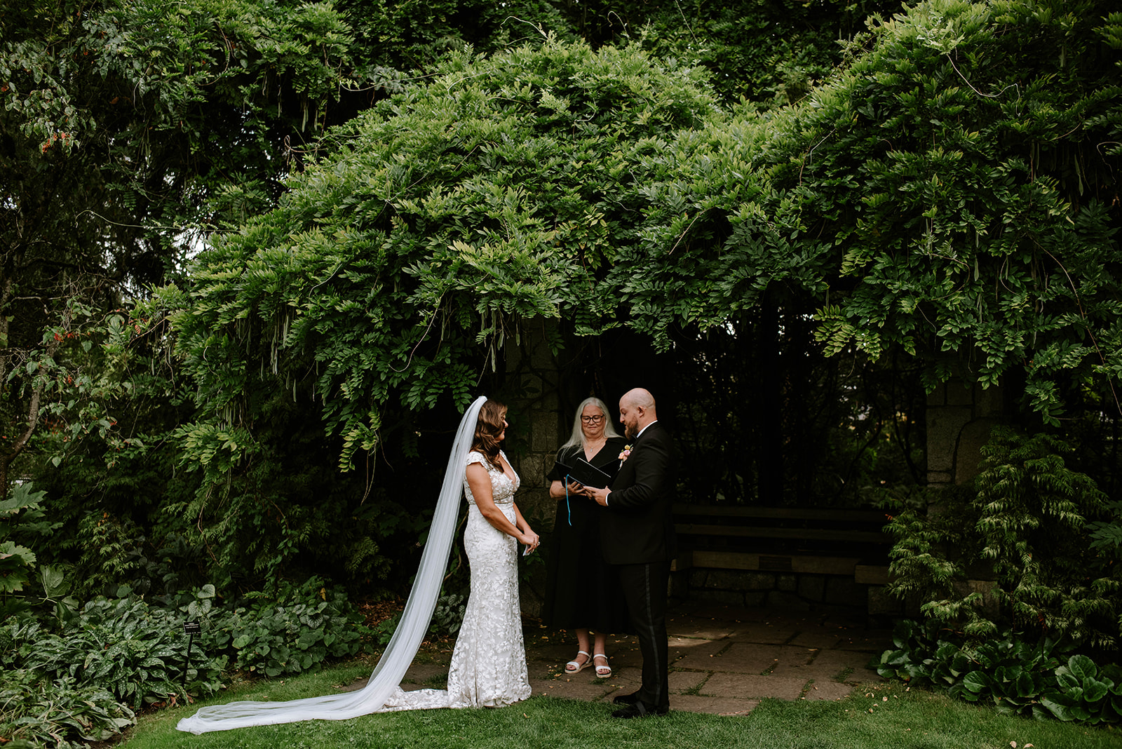 outdoor wedding ceremony at Van Dusen Botanical Gardens in Vancouver