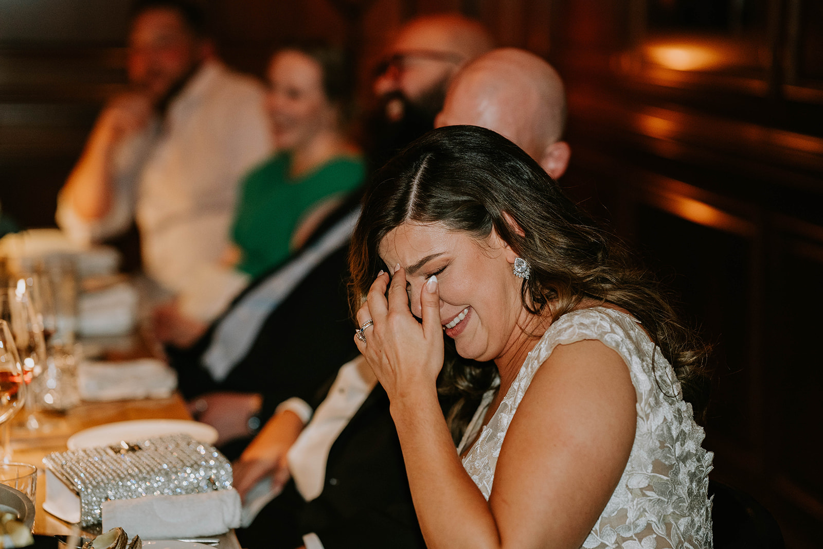 bride crying during wedding speeches