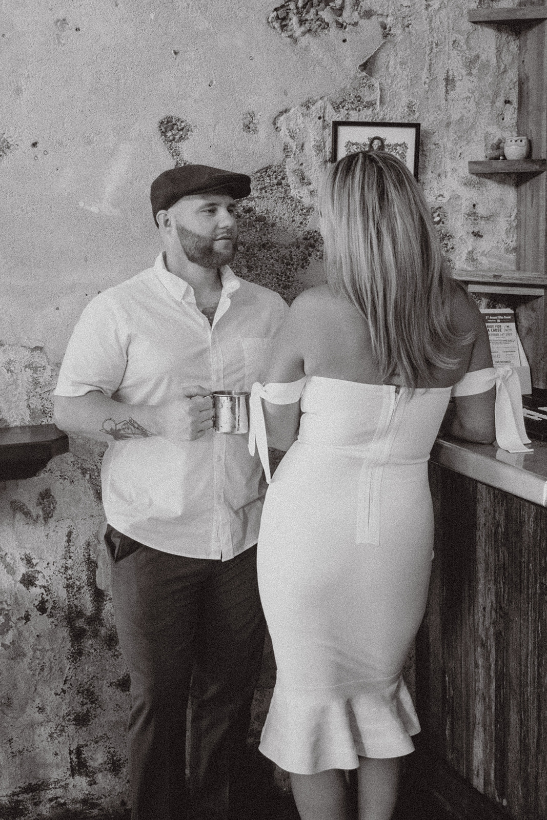 couple at their Romantic and cinematic speakeasy engagement session