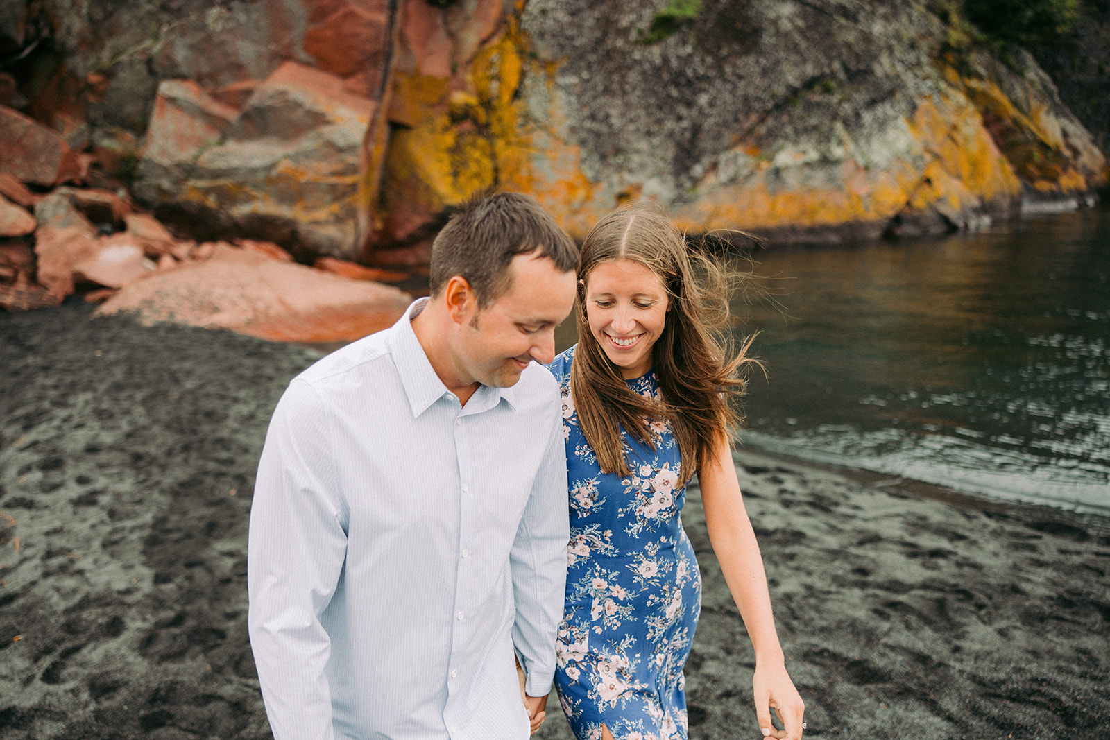 Scenic Black Beach moment: Jenna and AJ during their North Shore engagement session.