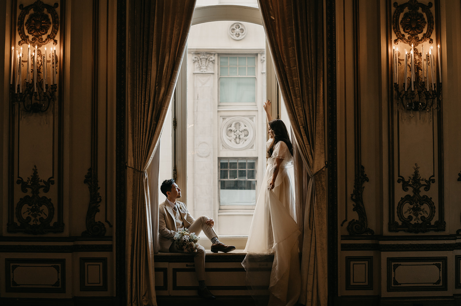 San Francisco Wedding Bride and groom in ornate window