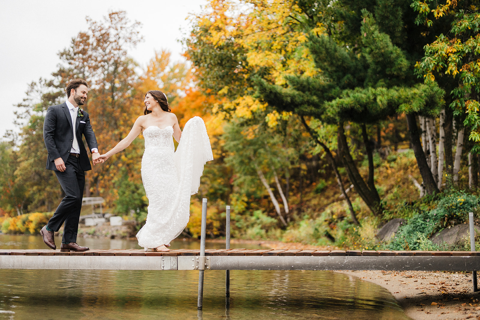 fall wedding couple at sugar lake lodge in Grand Rapids