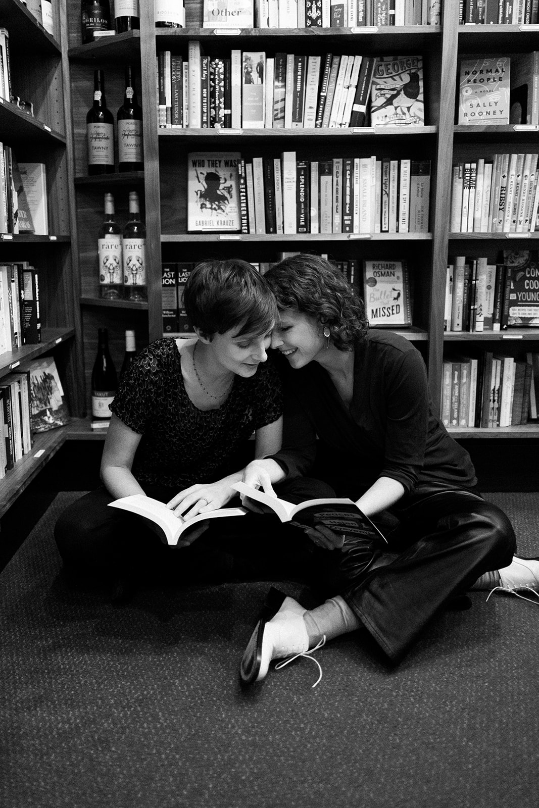 couple reads books at Leopold's bookstore and cafe in Madison, Wisconsin