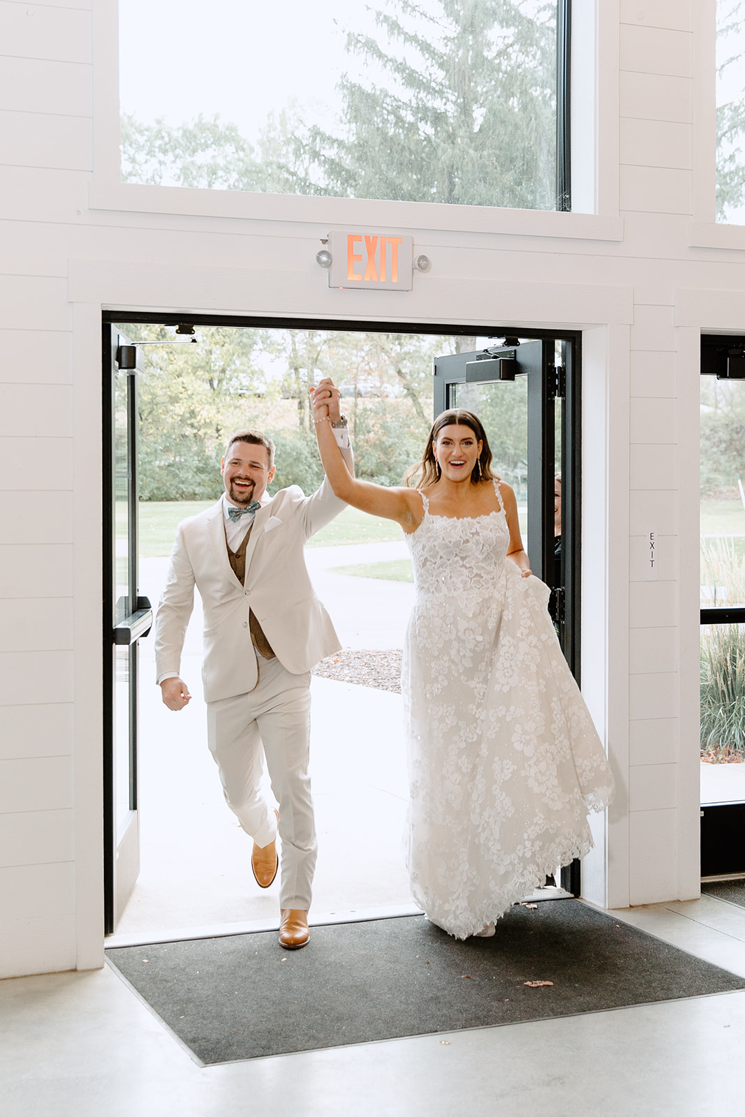 Bride and groom enter reception