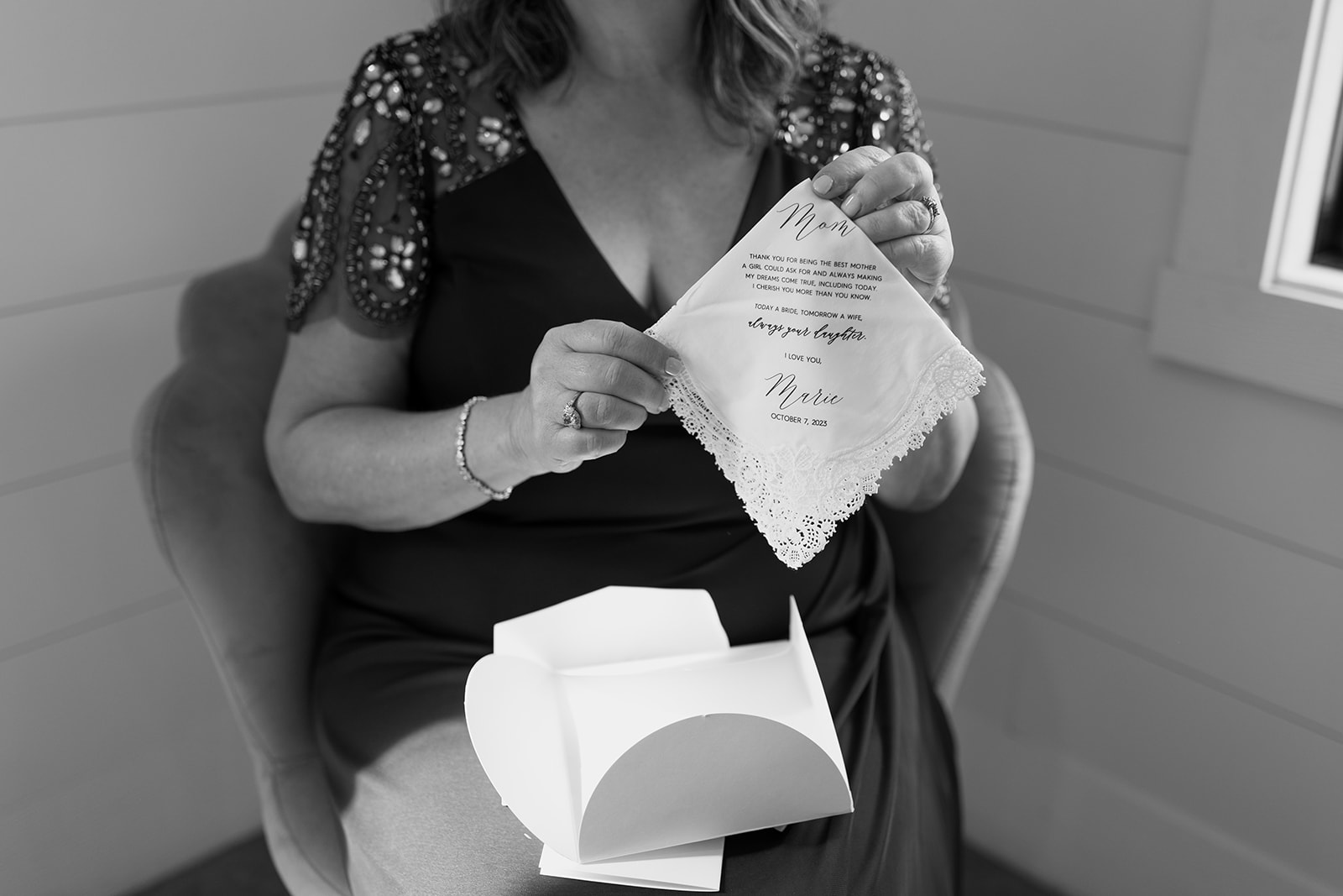 Mother of the bride opening a gift