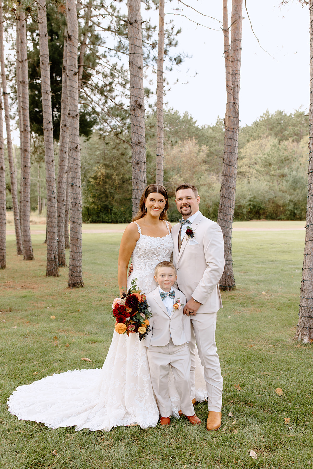 Bride, groom, and son