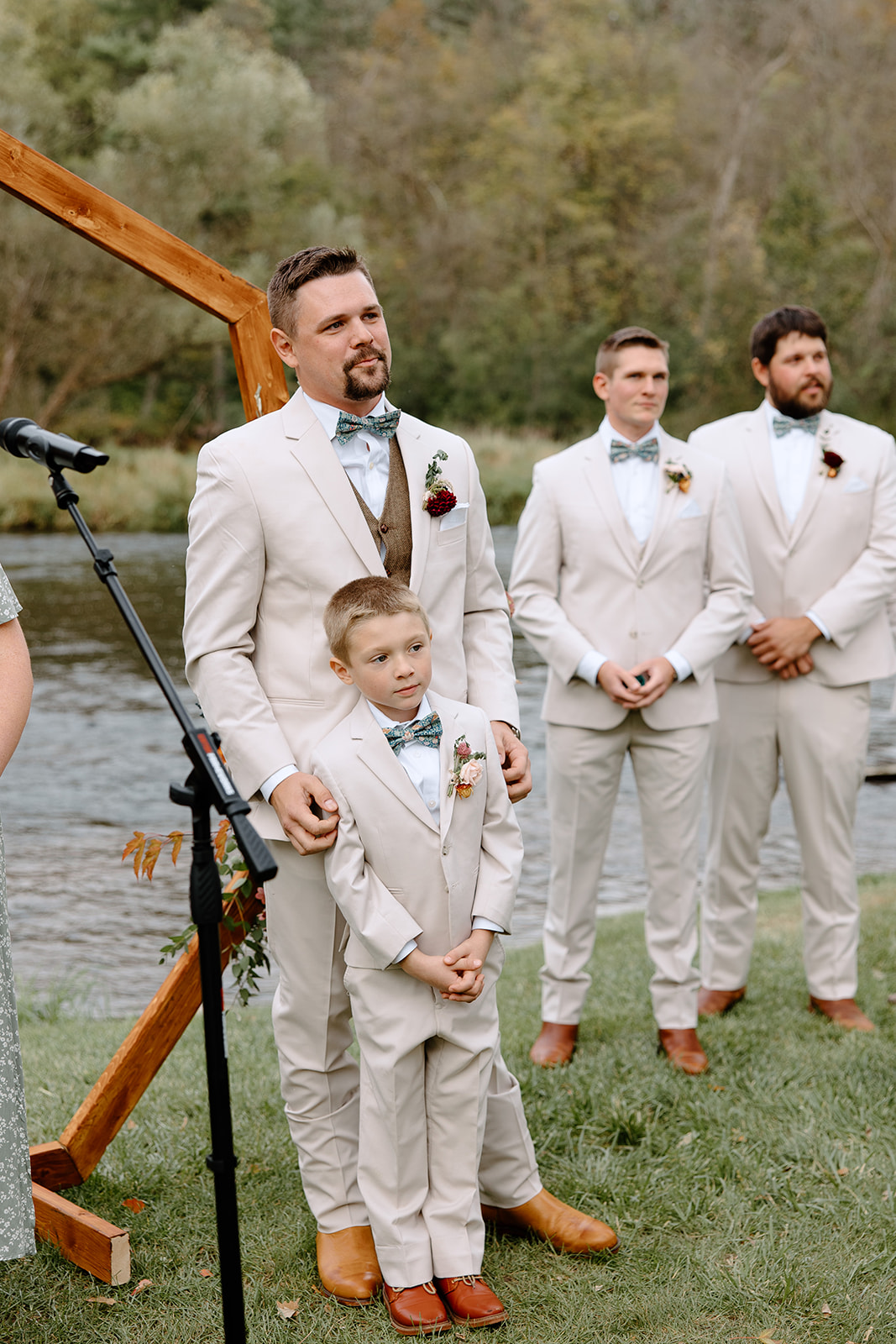 Groom and son wait for the bride