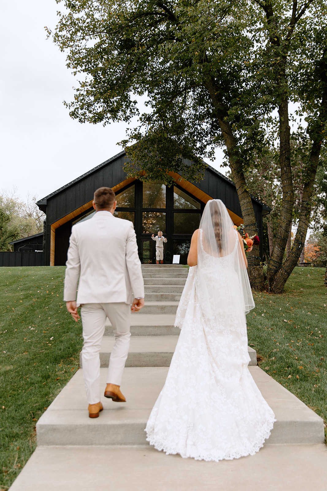 Bride and groom walk away from wedding ceremony