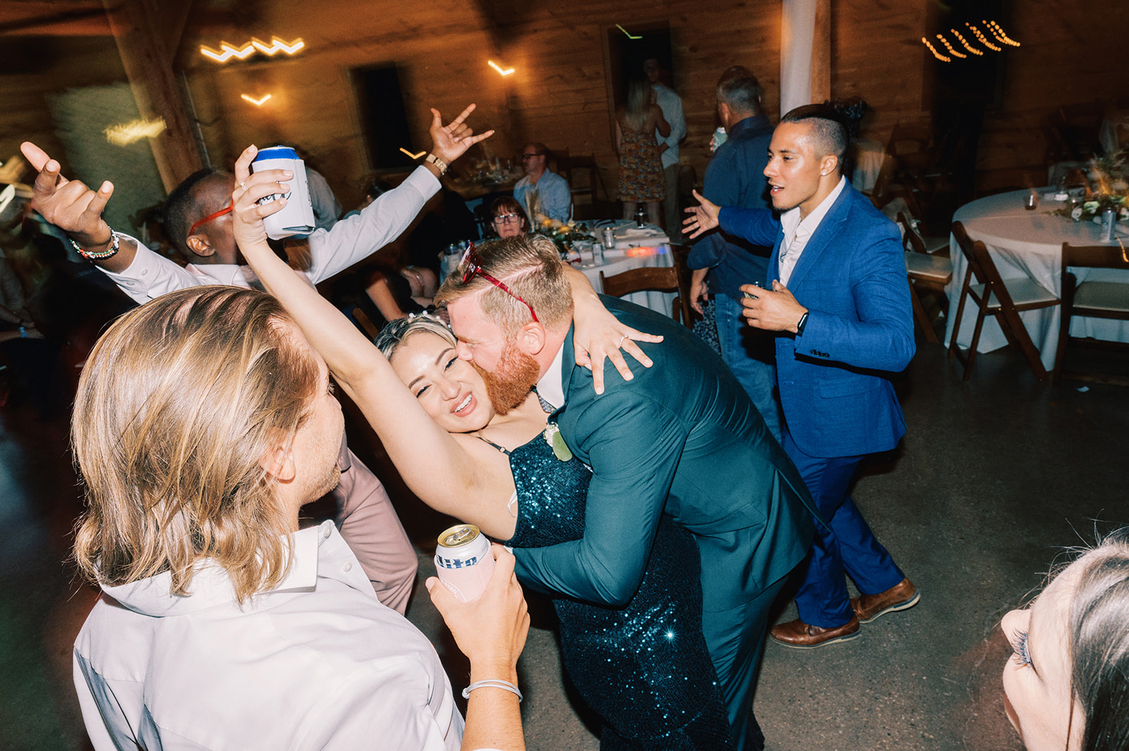 A bride and groom Embracing on the dancefloor  at chapel creek ranch in Denton TX 