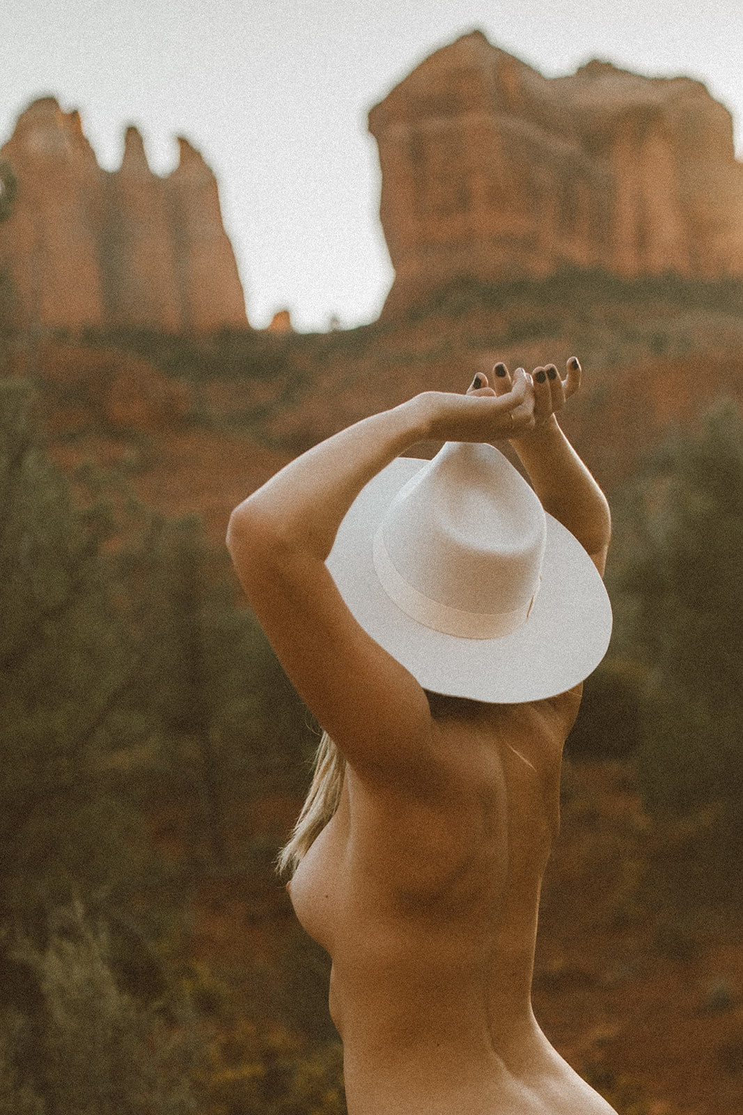Fine Art nude session, western cowgirl vibes, in Sedona AZ